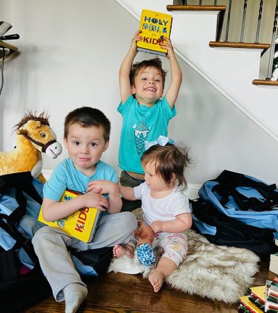 three-kids-holding-the-holy-bible-for-kids